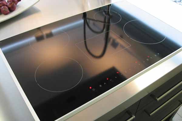 how to protect a glass top stove from cast iron